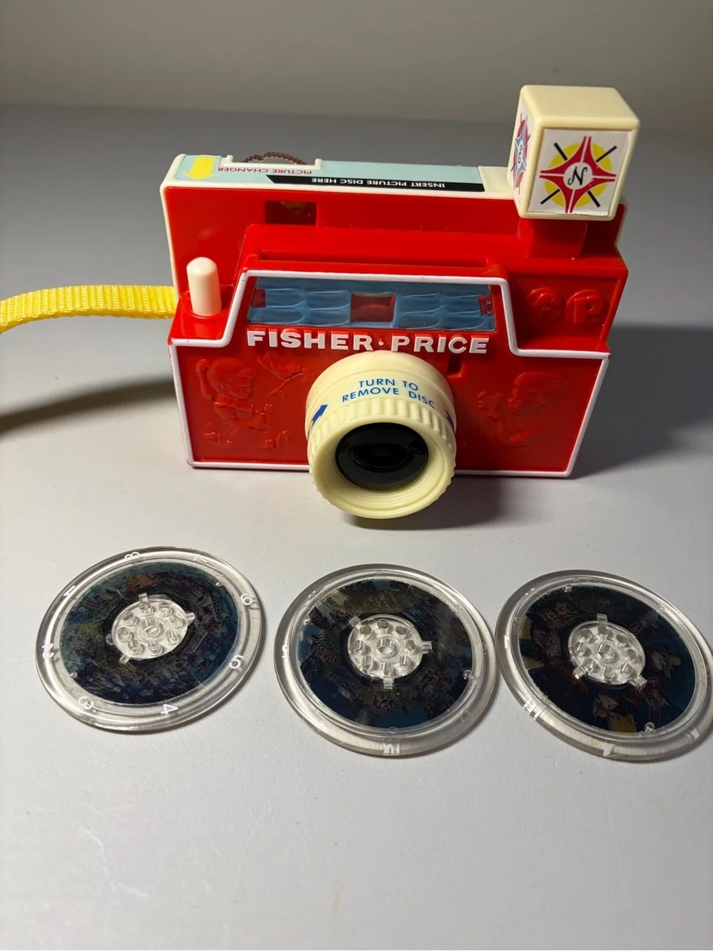 Fisher-Price Red Toy Camera with Yellow Strap and White Lens